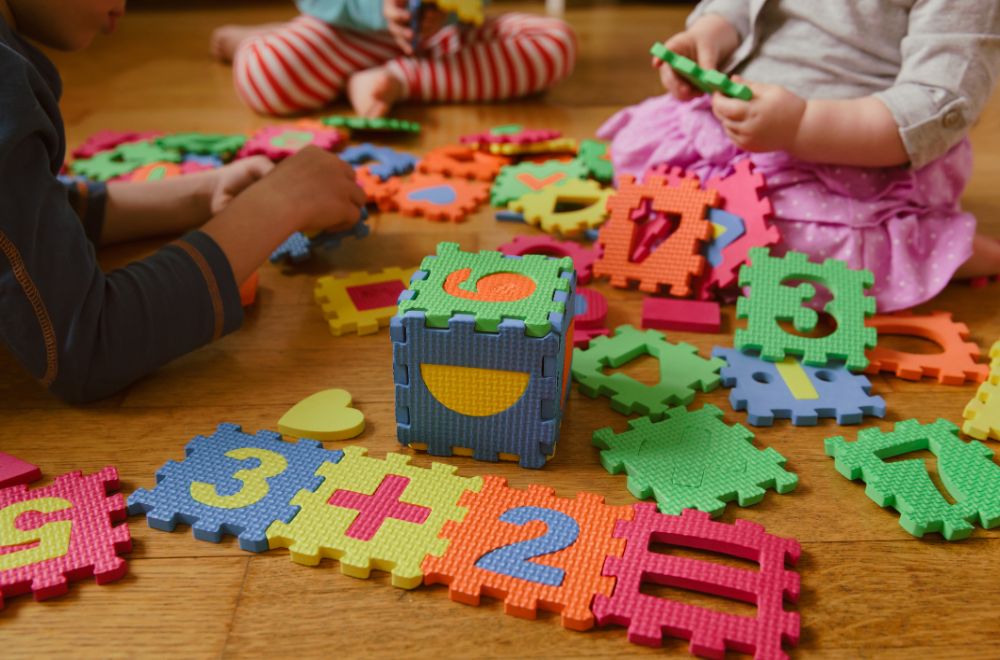kids playing with educational puzzle